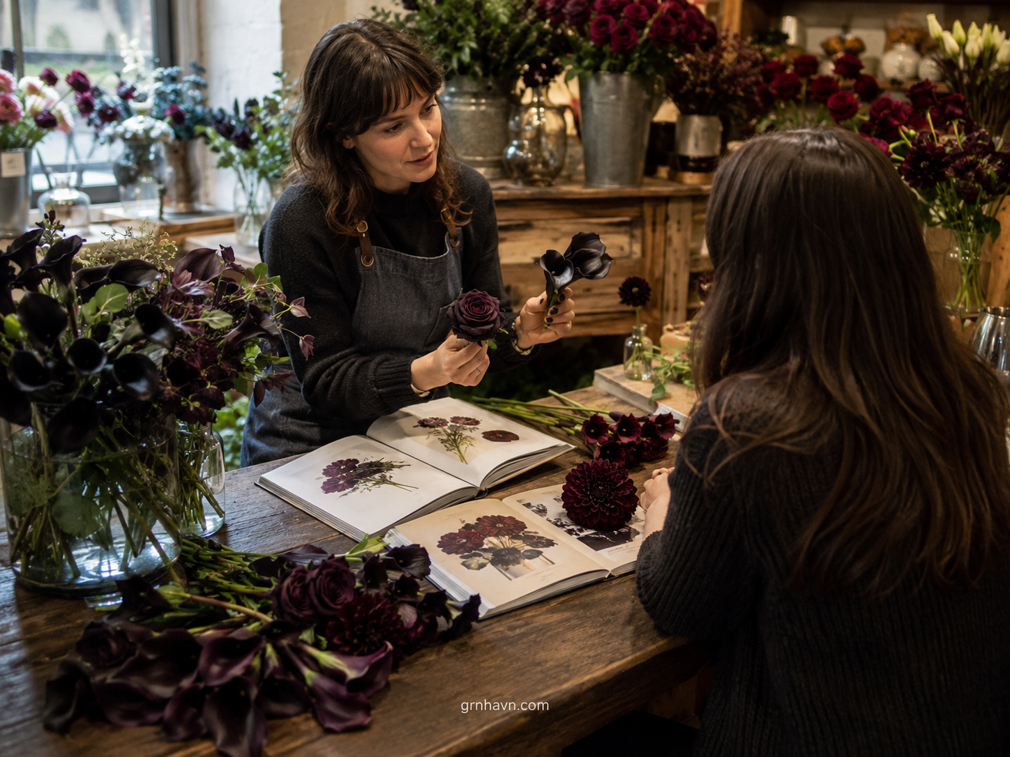 Moody near-black bouquet with deep purple and burgundy blossoms
